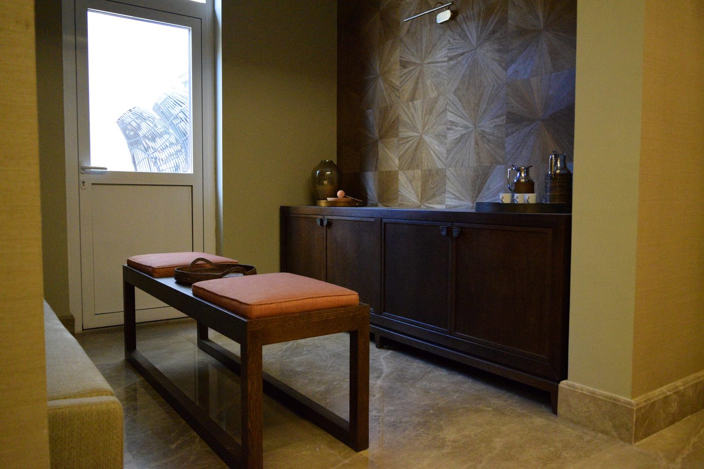Kuwait residence — upholstered bench in a niche