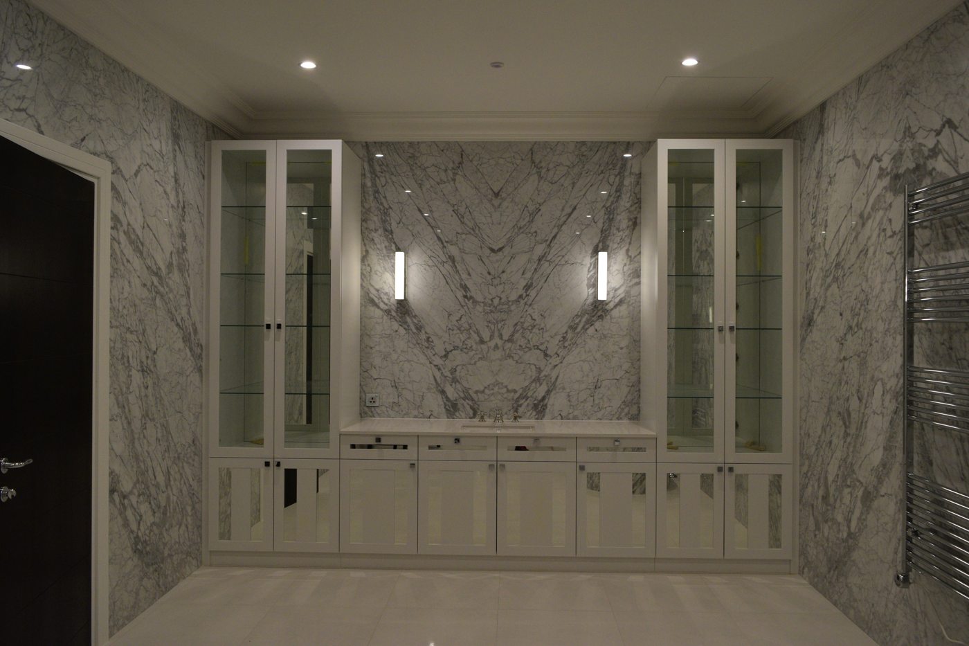 Kuwait residence — marble dressing room with glazed cabinetry